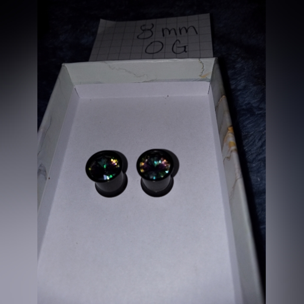 Black metal rainbow ear plugs zero gauge
